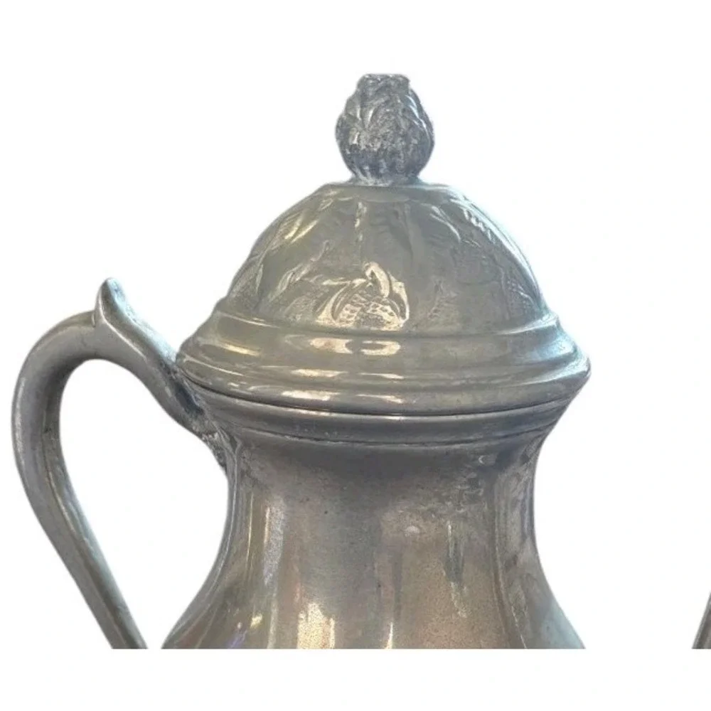 Vintage silver‎ plated teapot with hinged lid and floral engraving